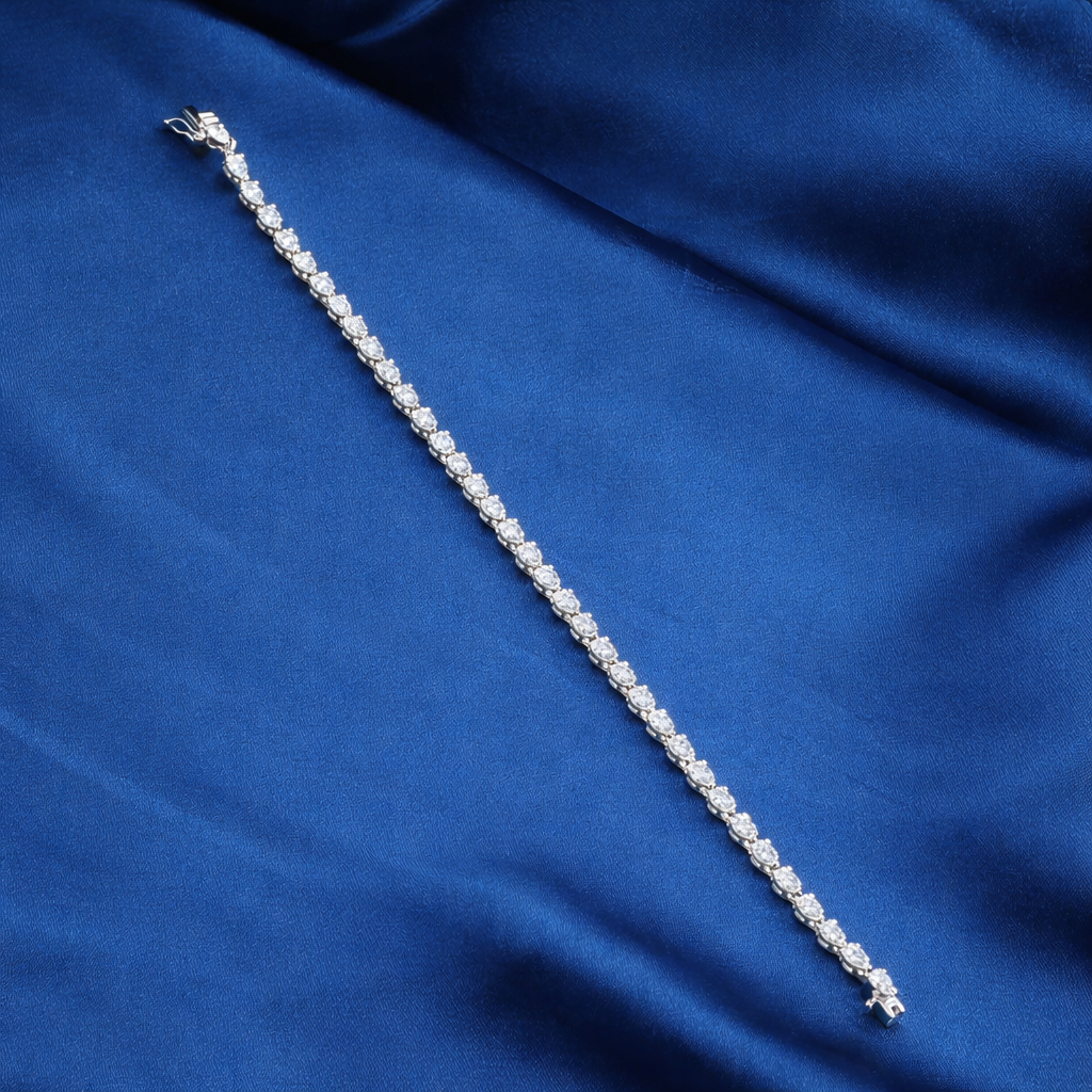 14KT White Gold Pear Shape Diamond Tennis Bracelet – 3.87 CT