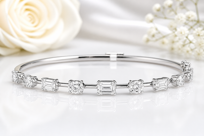 14Kt White Gold Emerald and Oval Diamond Bangle Size 7 | 1.41ctw Emerald | 1.36ctw Oval Diamond | Luxury Fine Jewelry Bracelet