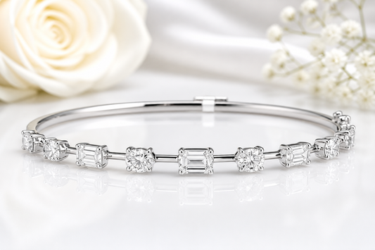 14Kt White Gold Emerald and Oval Diamond Bangle Size 7 | 1.41ctw Emerald | 1.36ctw Oval Diamond | Luxury Fine Jewelry Bracelet