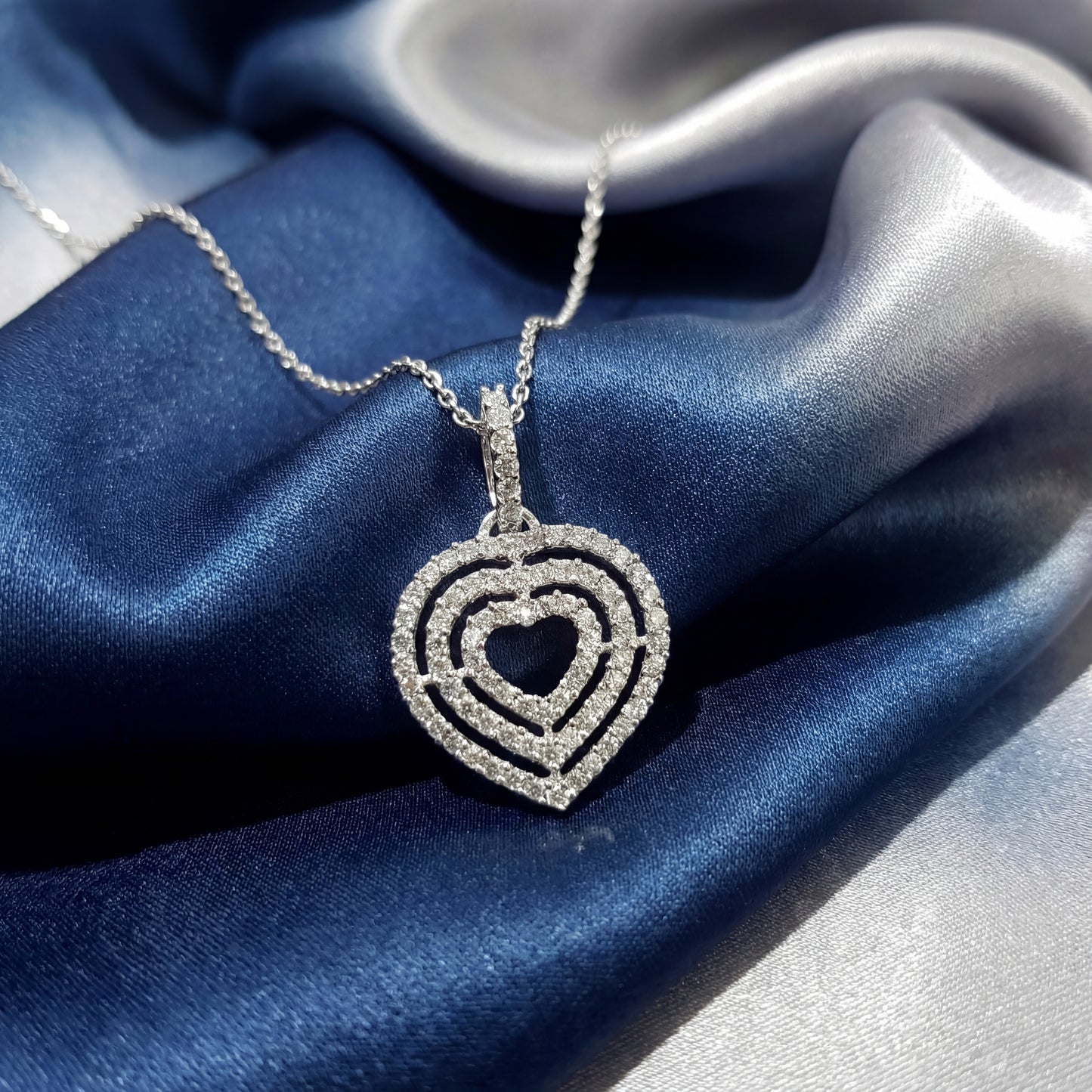 10K White Gold Diamond Triple Heart Pendant – 0.38 CTW