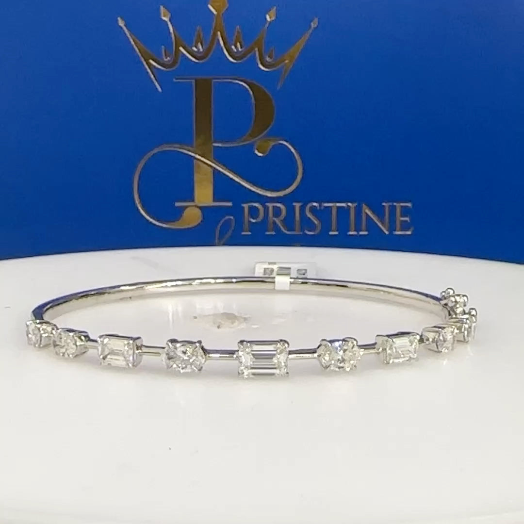 14Kt White Gold Emerald and Oval Diamond Bangle Size 7 | 1.41ctw Emerald | 1.36ctw Oval Diamond | Luxury Fine Jewelry Bracelet