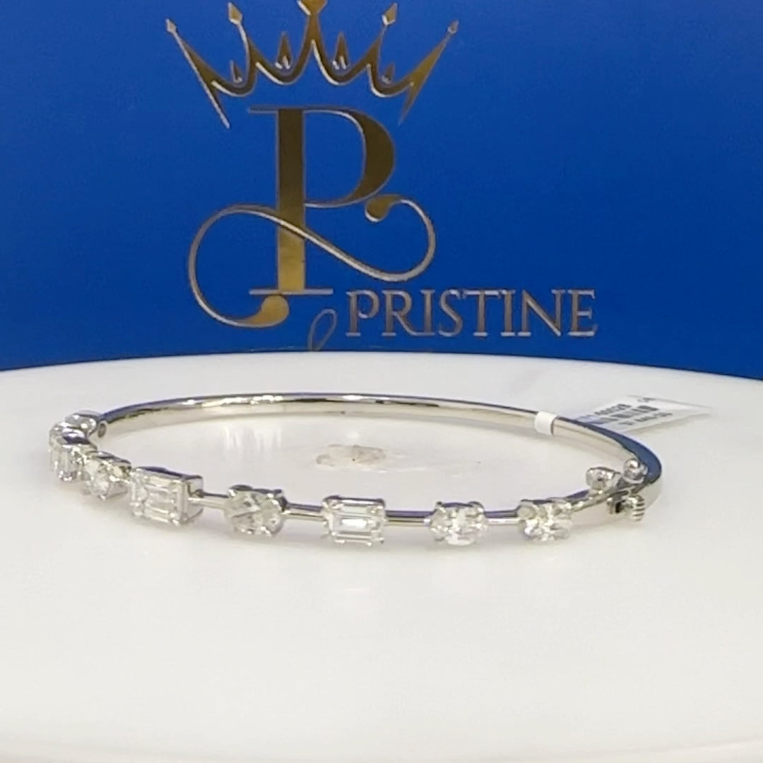 14Kt White Gold Emerald and Oval Diamond Bangle Size 7 | 1.41ctw Emerald | 1.36ctw Oval Diamond | Luxury Fine Jewelry Bracelet