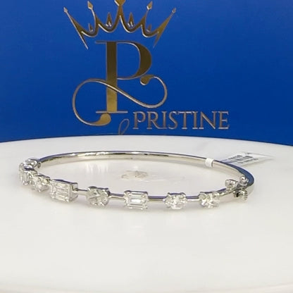 14Kt White Gold Emerald and Oval Diamond Bangle Size 7 | 1.41ctw Emerald | 1.36ctw Oval Diamond | Luxury Fine Jewelry Bracelet