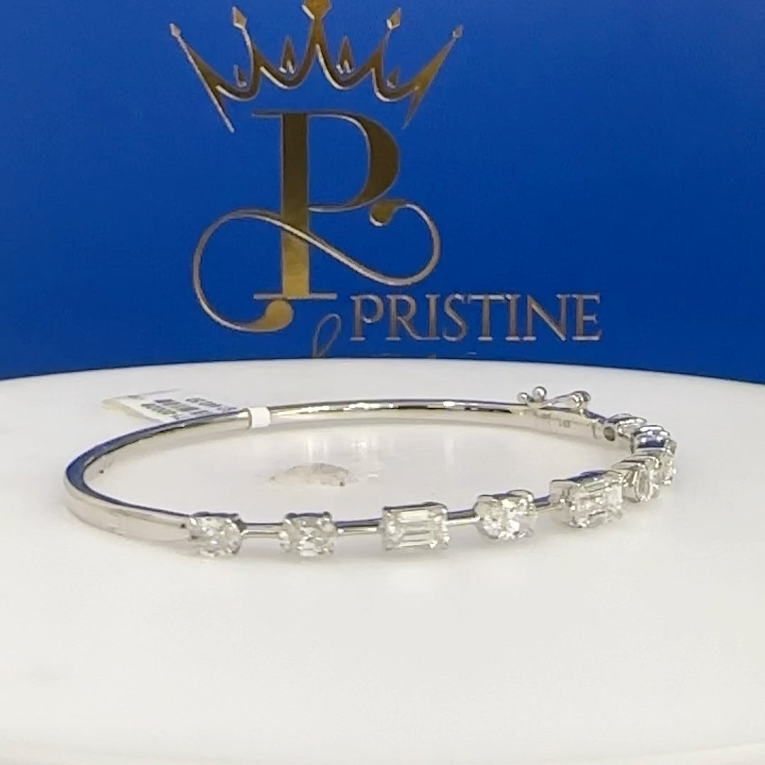 14Kt White Gold Emerald and Oval Diamond Bangle Size 7 | 1.41ctw Emerald | 1.36ctw Oval Diamond | Luxury Fine Jewelry Bracelet