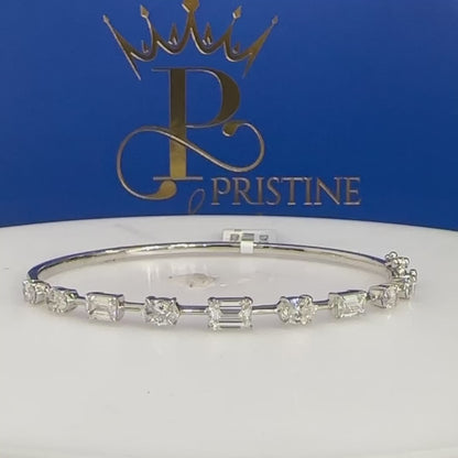 14Kt White Gold Emerald and Oval Diamond Bangle Size 7 | 1.41ctw Emerald | 1.36ctw Oval Diamond | Luxury Fine Jewelry Bracelet